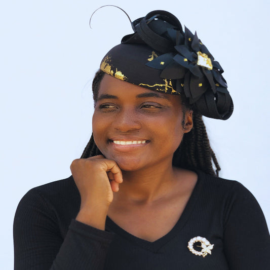 Woman wearing a decorative headwrap against a light blue background