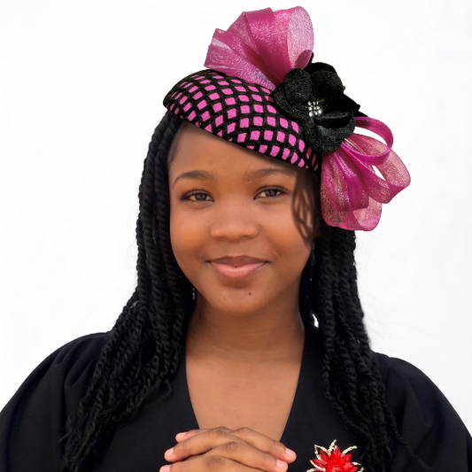 Woman wearing a decorative headband with pink and black colors on a white background