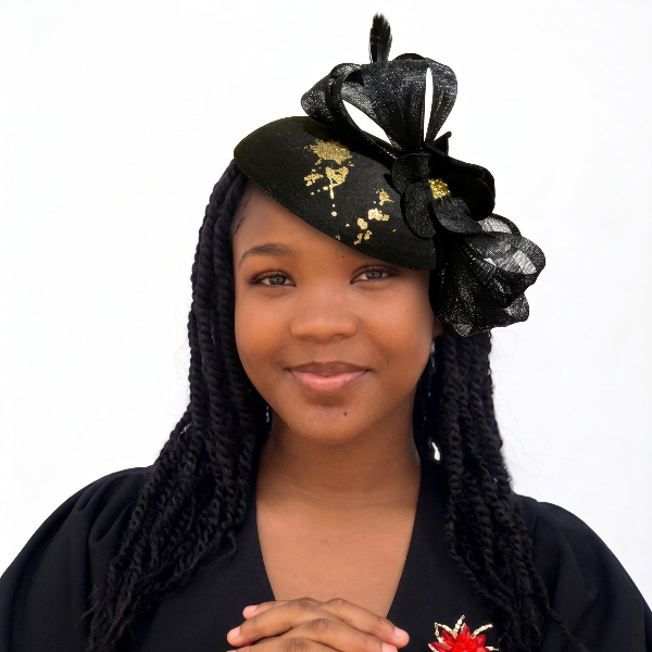Woman wearing a black headpiece with flowers and a black top with a red flower design.