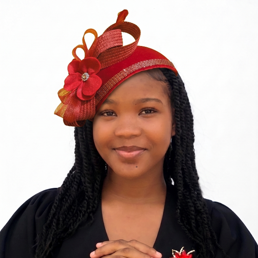 Woman wearing a red headpiece with floral decorations on a white background