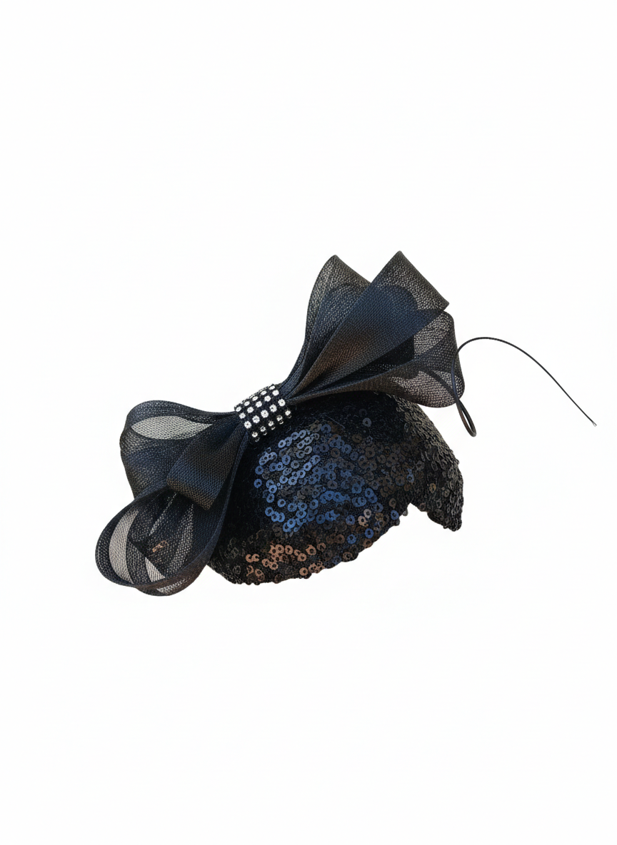 Decorative headband with large bow and sequin details on a white background