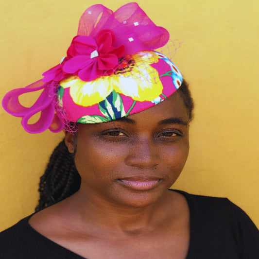 Fuchsia floral fascinator hat with pink mesh bow and flower embellishment – elegant women’s church hat for Sunday service, weddings, and special occasions.